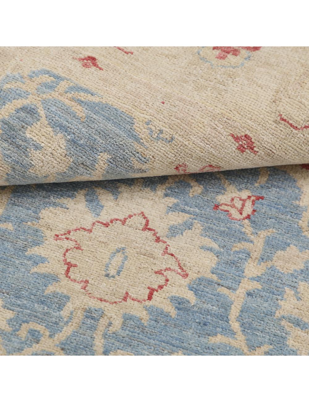 Ziegler 4' 1" X 6' 2" Hand-Knotted Wool Rug 4' 1" X 6' 2" (124 X 188) / Blue / Ivory