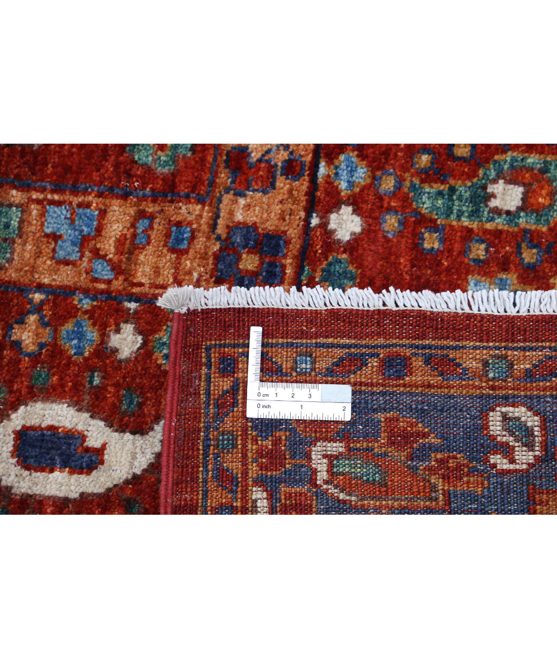 Humna 5'6'' X 7'11'' Hand-Knotted Wool Rug 5'6'' x 7'11'' (165 X 238) / Red / Blue