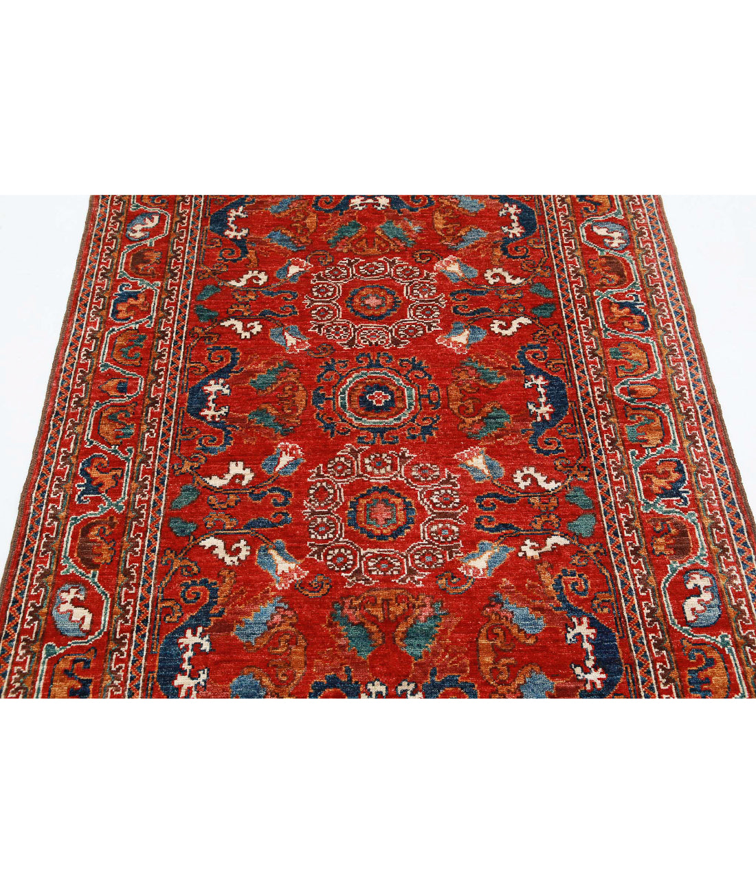 Humna 4'1'' X 5'10'' Hand-Knotted Wool Rug 4'1'' x 5'10'' (123 X 175) / Red / N/A