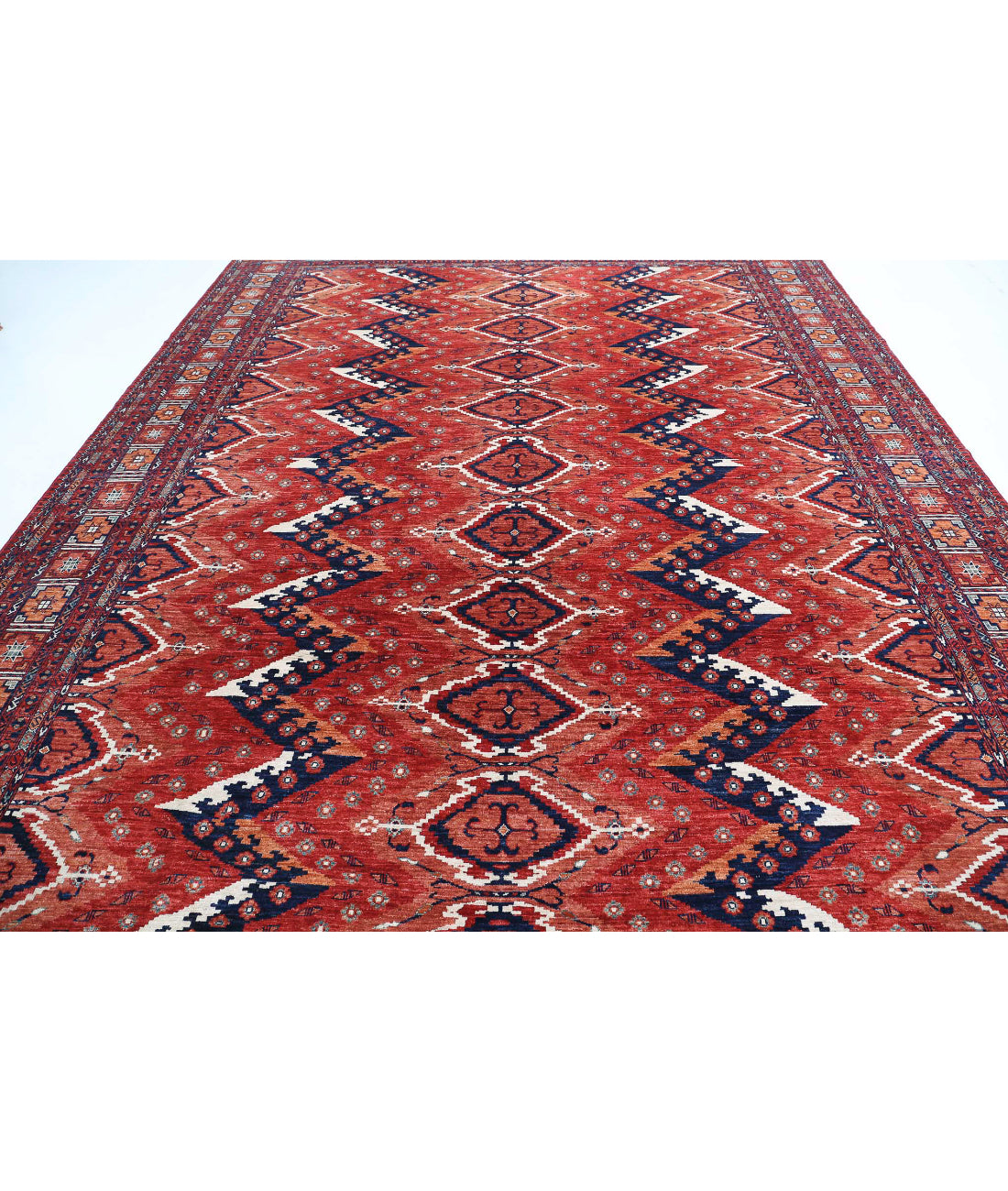 Humna 10'1'' X 13'9'' Hand-Knotted Wool Rug 10'1'' x 13'9'' (303 X 413) / Red / Rust
