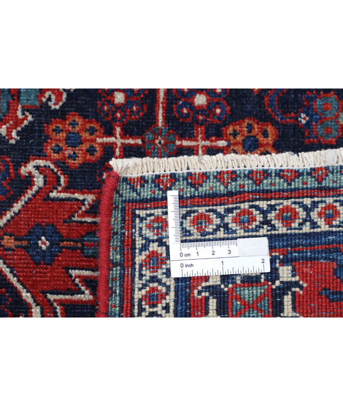 Josheghan 4'5'' X 6'8'' Hand-Knotted Wool Rug 4'5'' x 6'8'' (133 X 200) / Blue / Red