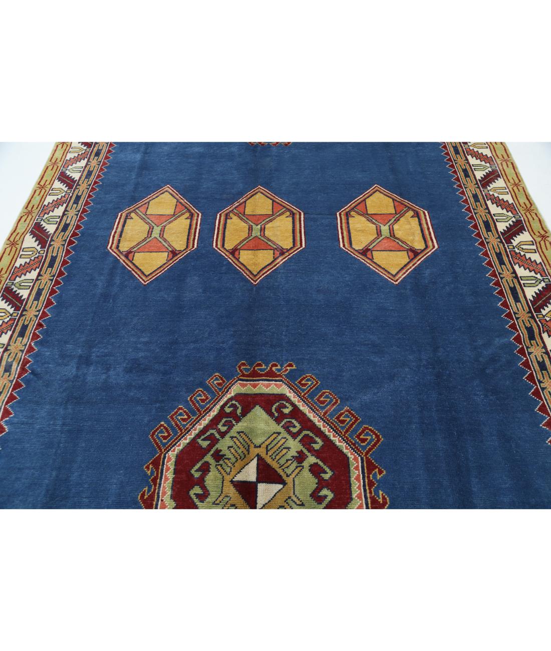 Kazak 7' 4" X 10' 10" Hand-Knotted Wool Rug 7' 4" X 10' 10" (224 X 330) / Blue / Ivory