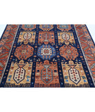 Humna 5'9'' X 8'10'' Hand-Knotted Wool Rug 5'9'' x 8'10'' (173 X 265) / Blue / Rust