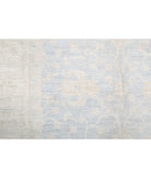 Serenity 4'10'' X 6'8'' Hand-Knotted Wool Rug 4'10'' x 6'8'' (145 X 200) / Blue / Ivory