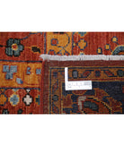 Humna 5'6'' X 7'10'' Hand-Knotted Wool Rug 5'6'' x 7'10'' (165 X 235) / Rust / Blue