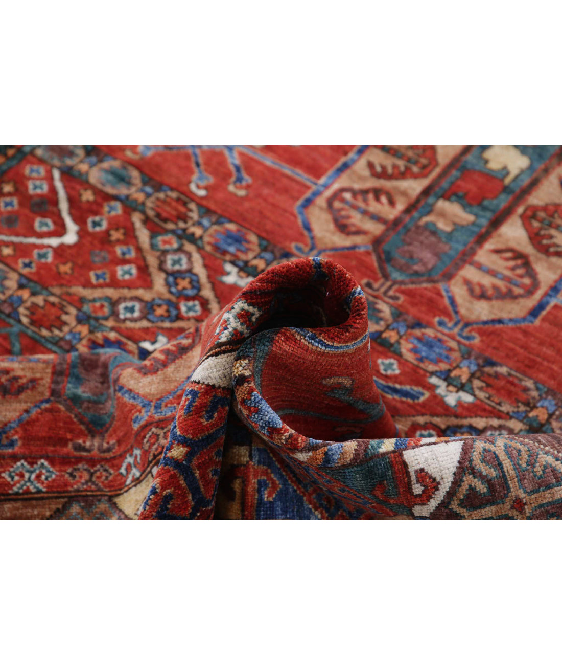 Humna 5'5'' X 6'8'' Hand-Knotted Wool Rug 5'5'' x 6'8'' (163 X 200) / Red / Blue