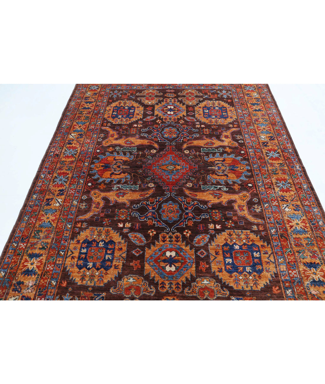 Humna 6'0'' X 8'10'' Hand-Knotted Wool Rug 6'0'' x 8'10'' (180 X 265) / Brown / Gold