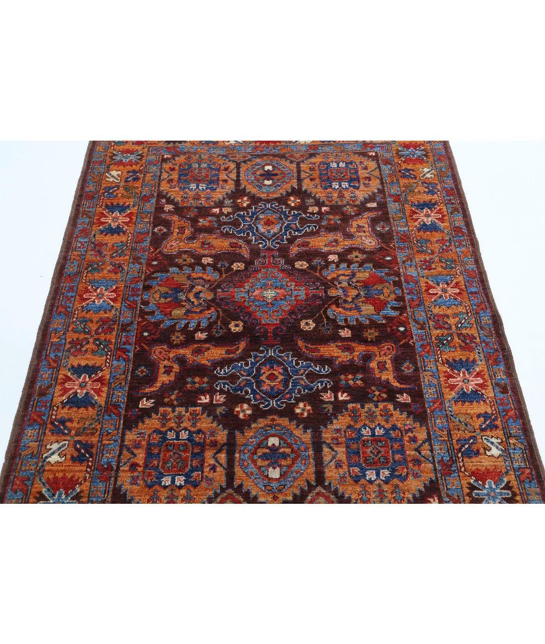 Humna 4'1'' X 5'7'' Hand-Knotted Wool Rug 4'1'' x 5'7'' (123 X 168) / Brown / Gold