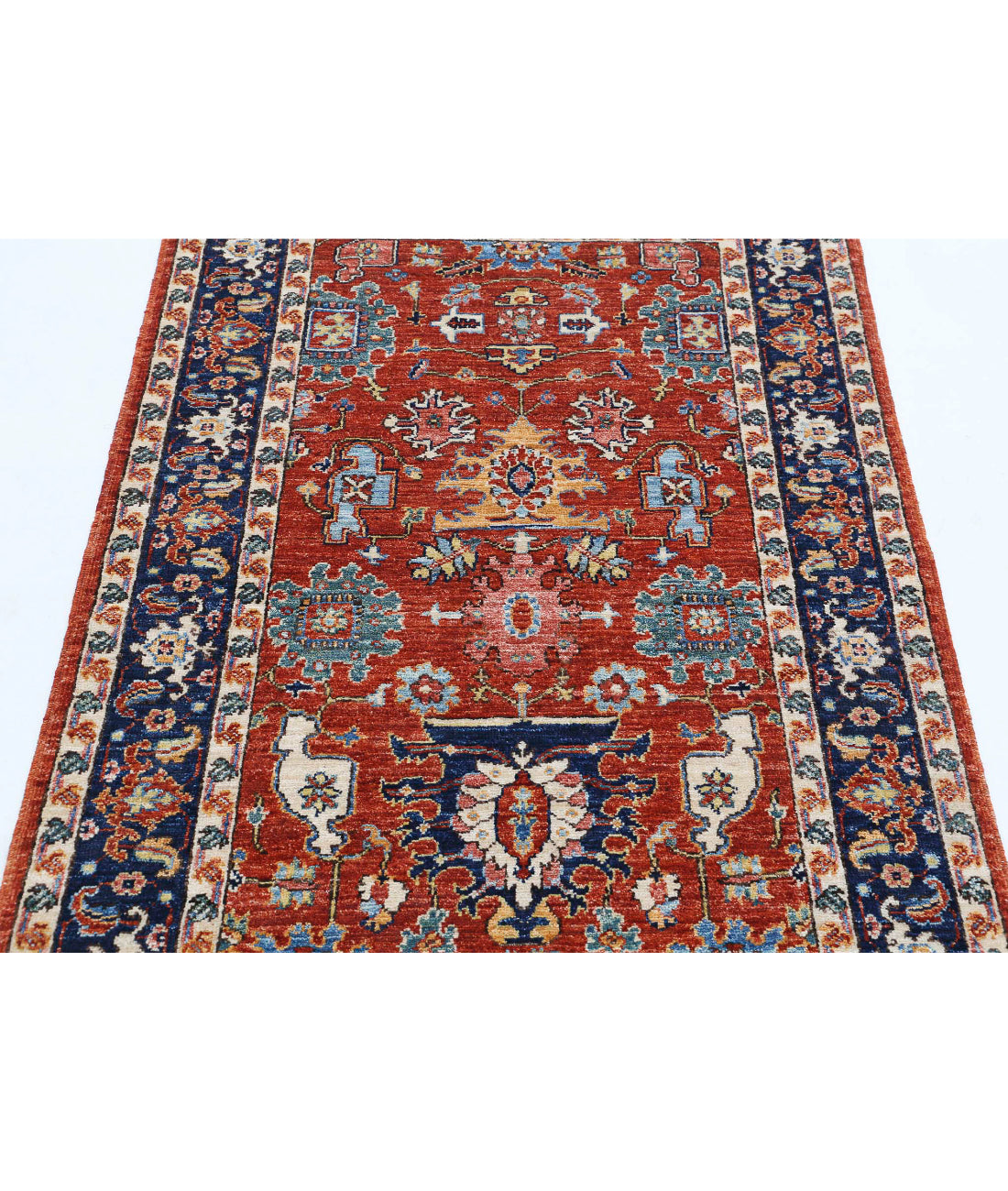 Humna 3'2'' X 4'10'' Hand-Knotted Wool Rug 3'2'' x 4'10'' (95 X 145) / Rust / Blue