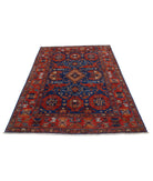 Humna 4'11'' X 6'9'' Hand-Knotted Wool Rug 4'11'' x 6'9'' (148 X 203) / Blue / Red