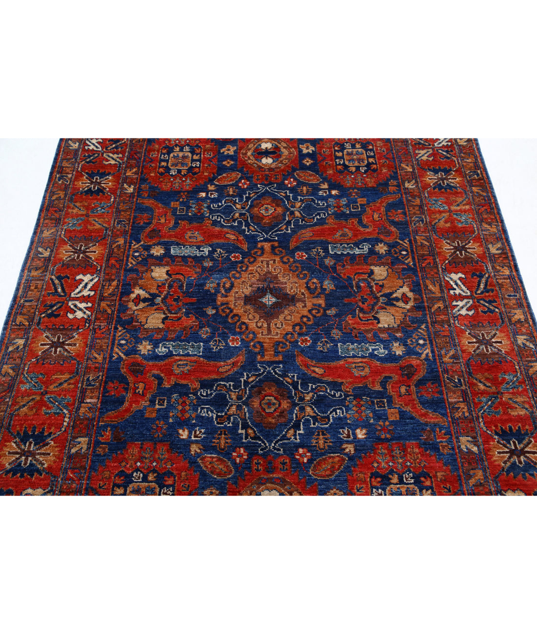 Humna 4'11'' X 6'9'' Hand-Knotted Wool Rug 4'11'' x 6'9'' (148 X 203) / Blue / Red