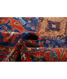 Humna 4'11'' X 6'9'' Hand-Knotted Wool Rug 4'11'' x 6'9'' (148 X 203) / Blue / Red