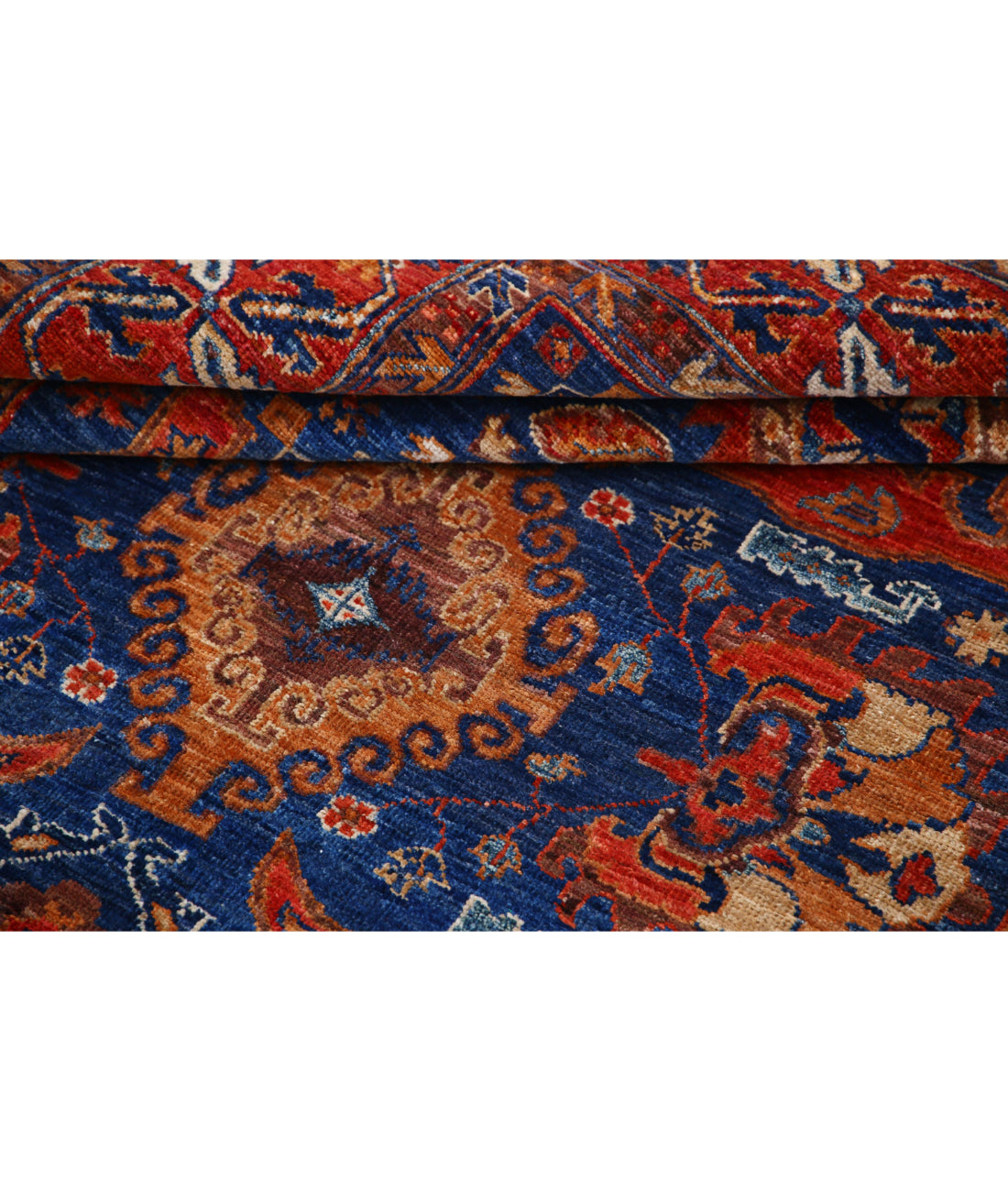 Humna 4'11'' X 6'9'' Hand-Knotted Wool Rug 4'11'' x 6'9'' (148 X 203) / Blue / Red