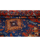 Humna 4'11'' X 6'9'' Hand-Knotted Wool Rug 4'11'' x 6'9'' (148 X 203) / Blue / Red