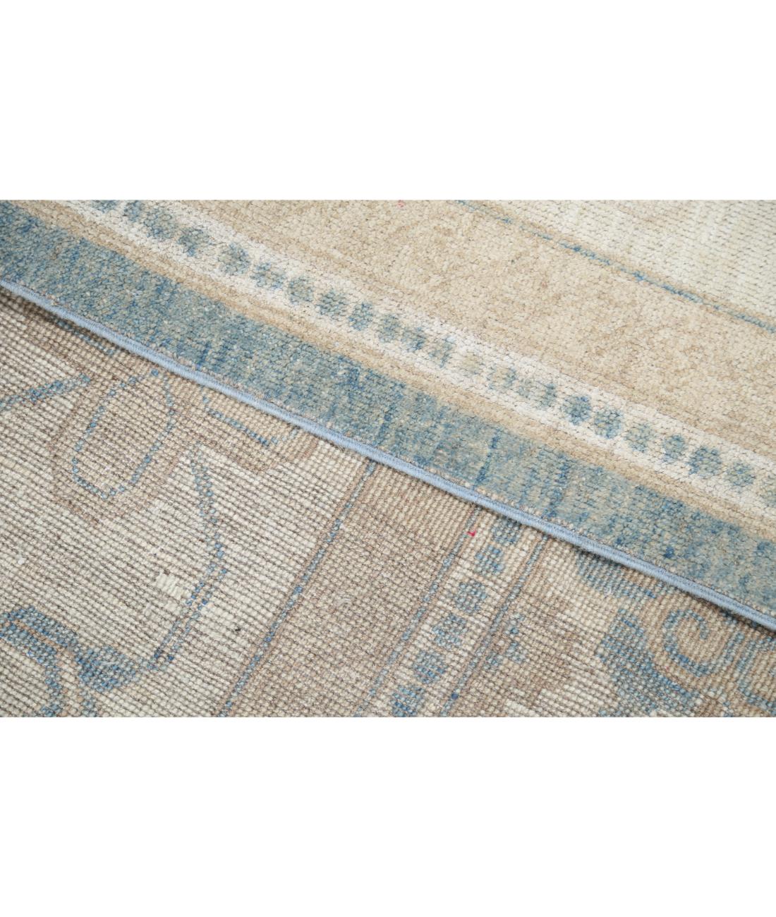 Khotan 9' 9" X 13' 9" Hand-Knotted Wool Rug 9' 9" X 13' 9" (297 X 419) / Blue / Ivory