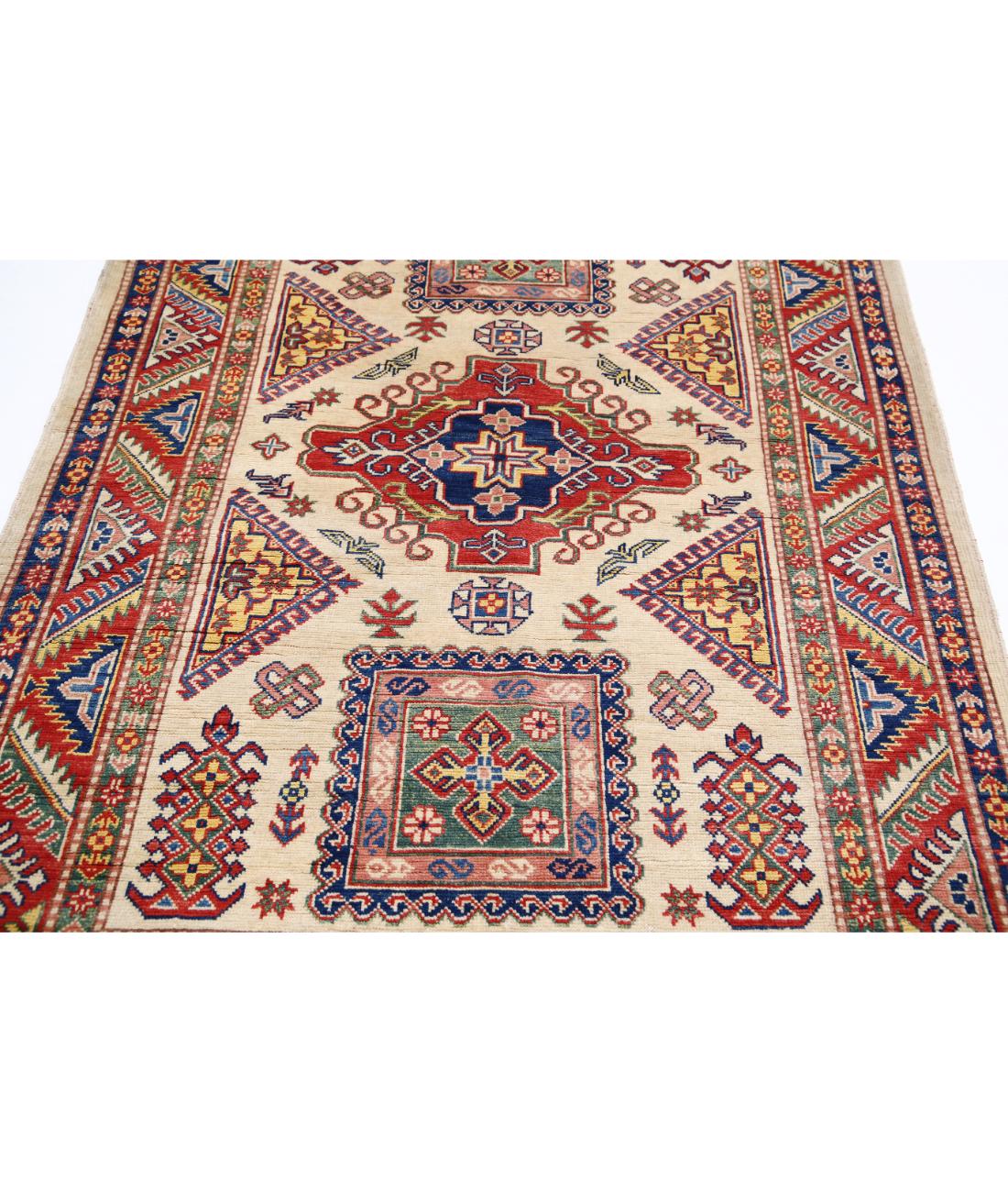 Kazak 4' 9" X 6' 7" Hand-Knotted Wool Rug 4' 9" X 6' 7" (145 X 201) / Ivory / Red