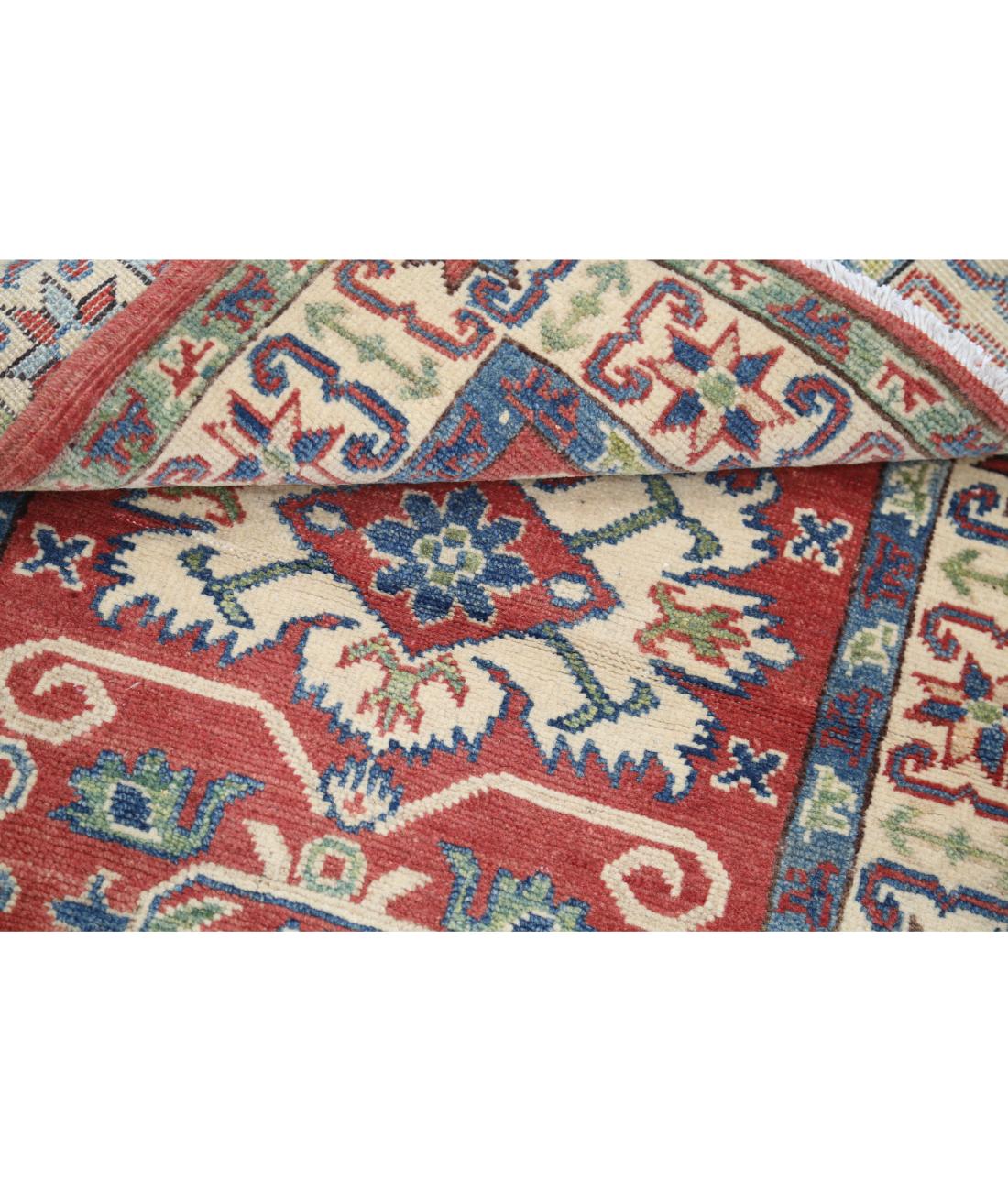 Kazak 2' 8" X 4' 0" Hand-Knotted Wool Rug 2' 8" X 4' 0" (81 X 122) / Red / Ivory