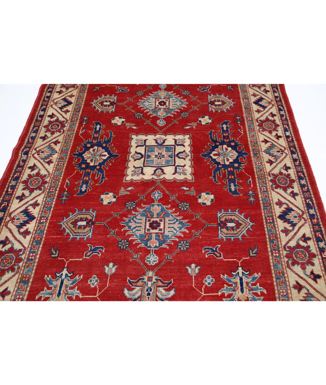 Kazak 5' 0" X 7' 9" Hand-Knotted Wool Rug 5' 0" X 7' 9" (152 X 236) / Red / Ivory