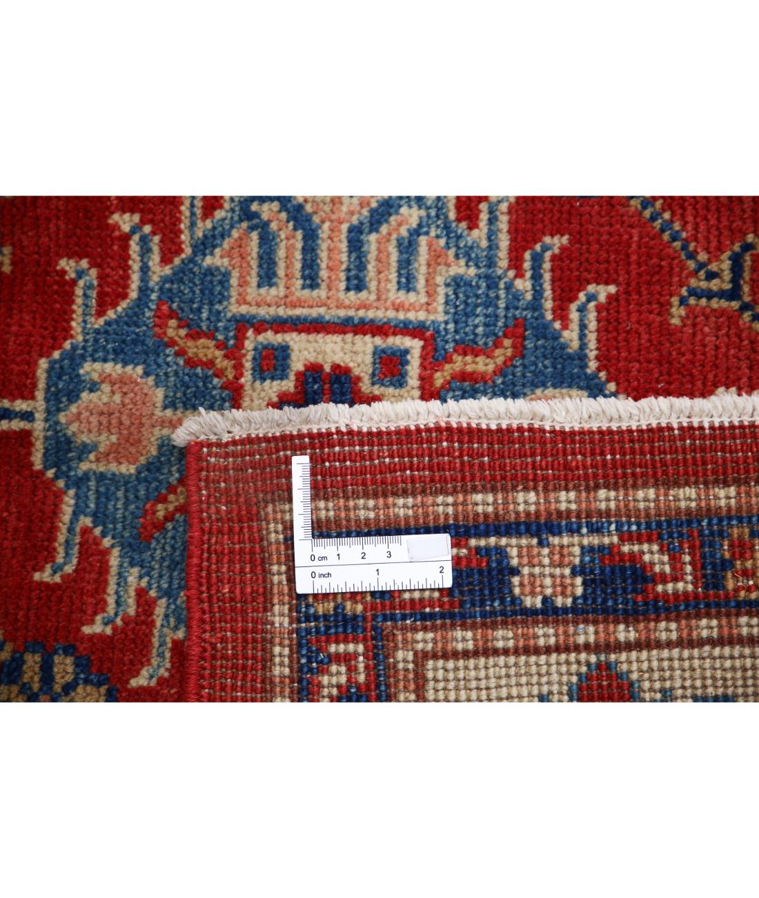 Kazak 5' 0" X 7' 9" Hand-Knotted Wool Rug 5' 0" X 7' 9" (152 X 236) / Red / Ivory