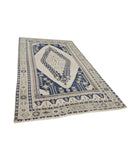 Taspinar 5' 5" X 9' 6" Hand-Knotted Wool Rug 5' 5" X 9' 6" (165 X 290) / Ivory / Blue